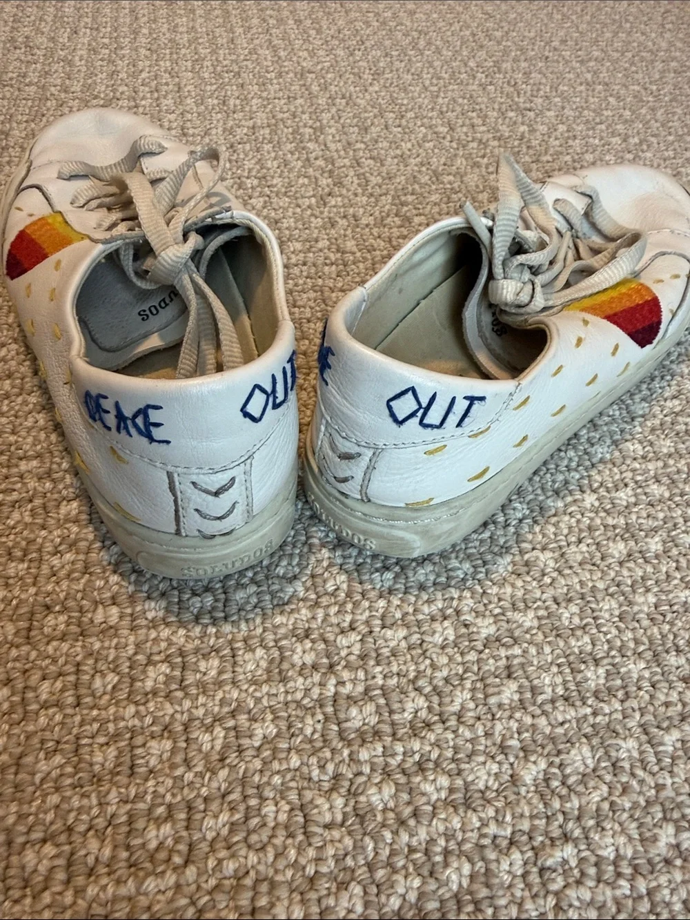 Soludos White Leather Sneakers with Red and Yellow Sunburst Detail